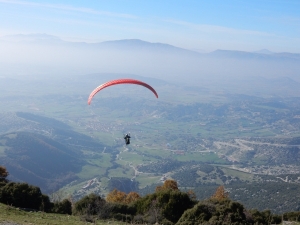 Beginner paragliding pilot first high flights Olympic Wings