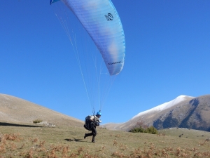 Beginner paragliding pilot first high flights Olympic Wings